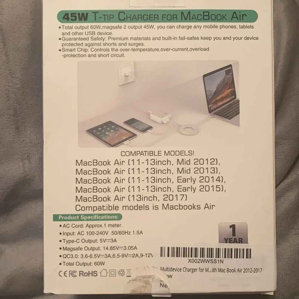 MacBook Air charger. 45w. Additional USB & Type-C charge for other gadgets.